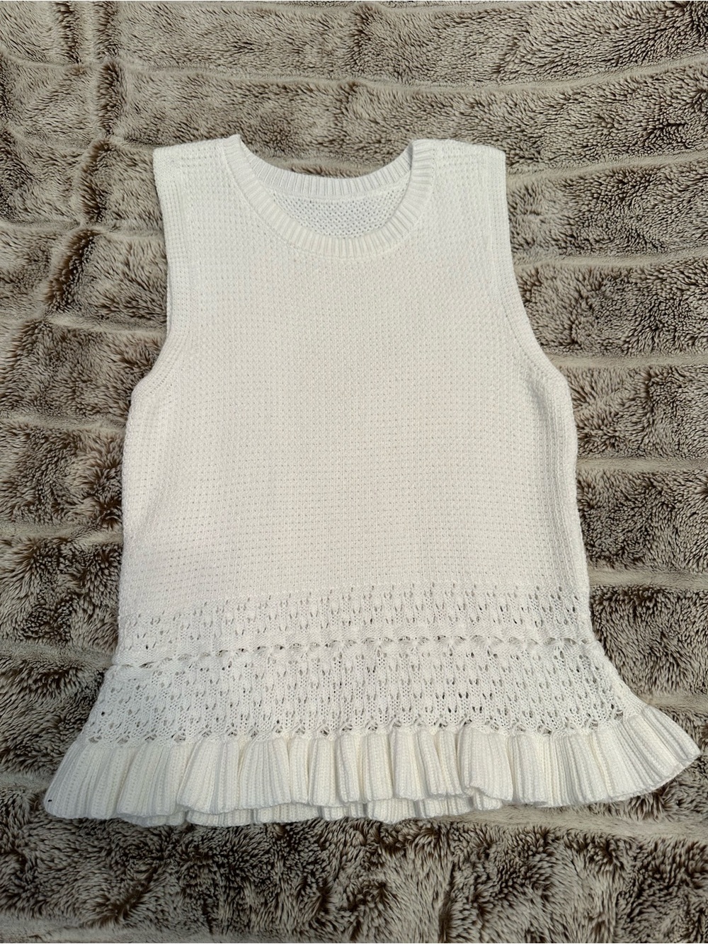 Women’s White Knit Sleeveless Top with Ruffle Hem